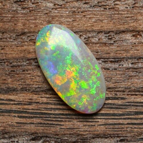 Discover the mystique of opals in their unprocessed form, showcasing the captivating colors and natural opulence of Australian black opals.