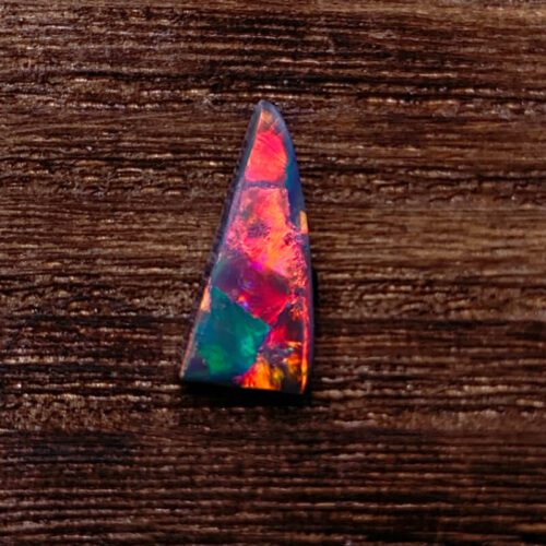 Uncover the hidden beauty of Australia's black opal rough, each stone capturing the deep allure and enchantment of the continent.