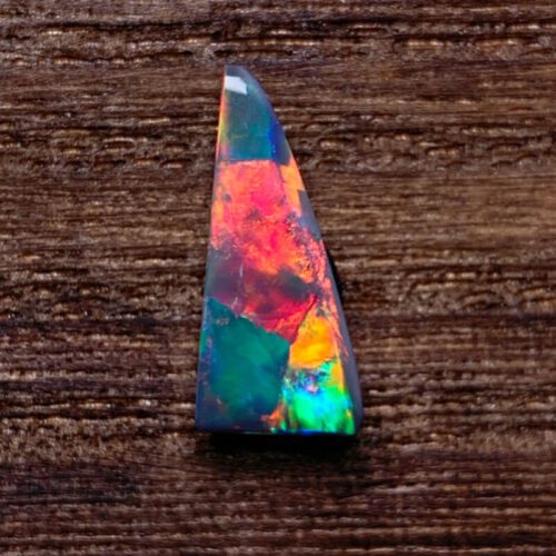 Uncover the hidden beauty of Australia's black opal rough, each stone capturing the deep allure and enchantment of the continent.