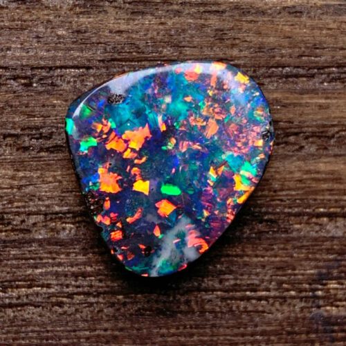 Uncover the hidden beauty of Australia's black opal rough, each stone capturing the deep allure and enchantment of the continent.