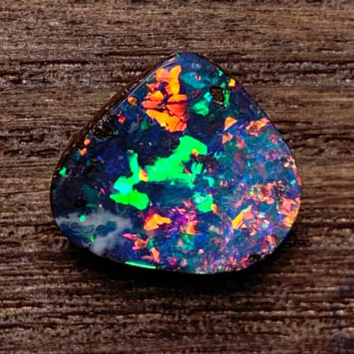 Uncover the hidden beauty of Australia's black opal rough, each stone capturing the deep allure and enchantment of the continent.