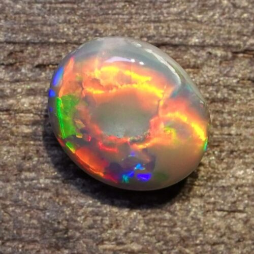 Authentic Australian black opals at wholesale rates. Discover opal rings, gemstone jewelry, and opal necklaces