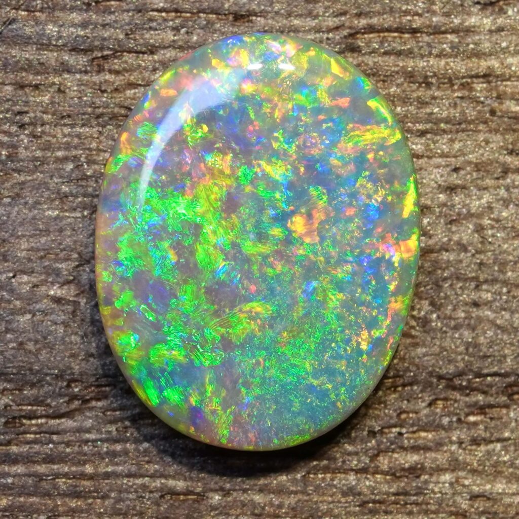 6.49cts, Full Face Pinfire Flash Australian Semi Black Opal