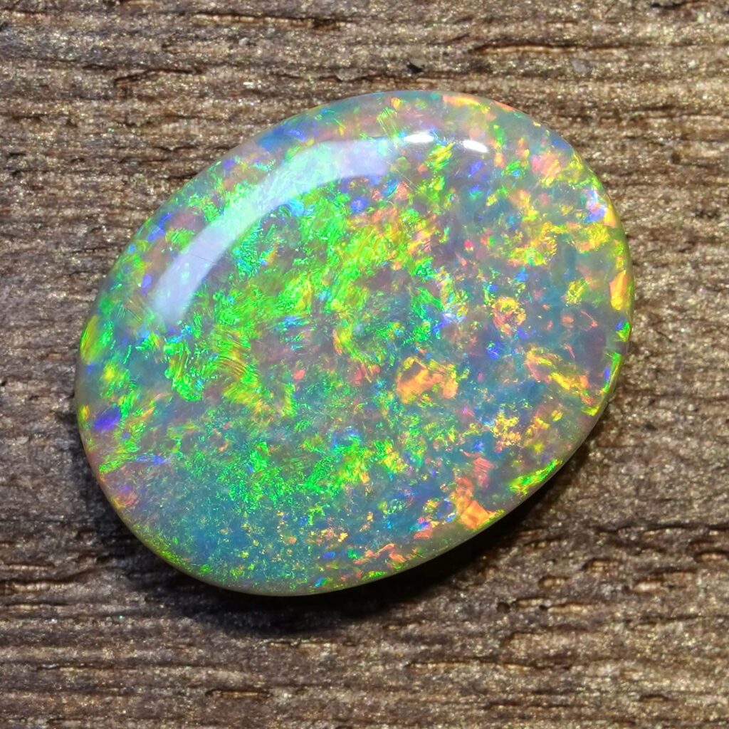 6.49cts, Full Face Pinfire Flash Australian Semi Black Opal